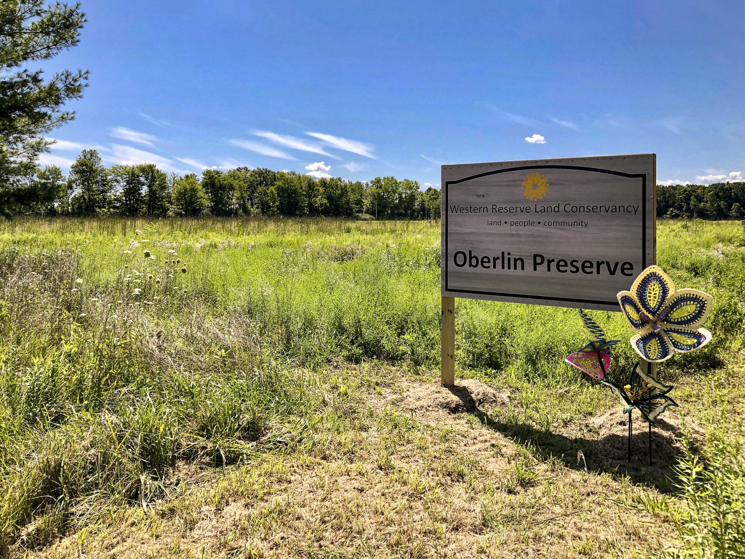 The welcome sign at Oberlin Preserve invites visitors to enjoy the beauty and wonder of nature.